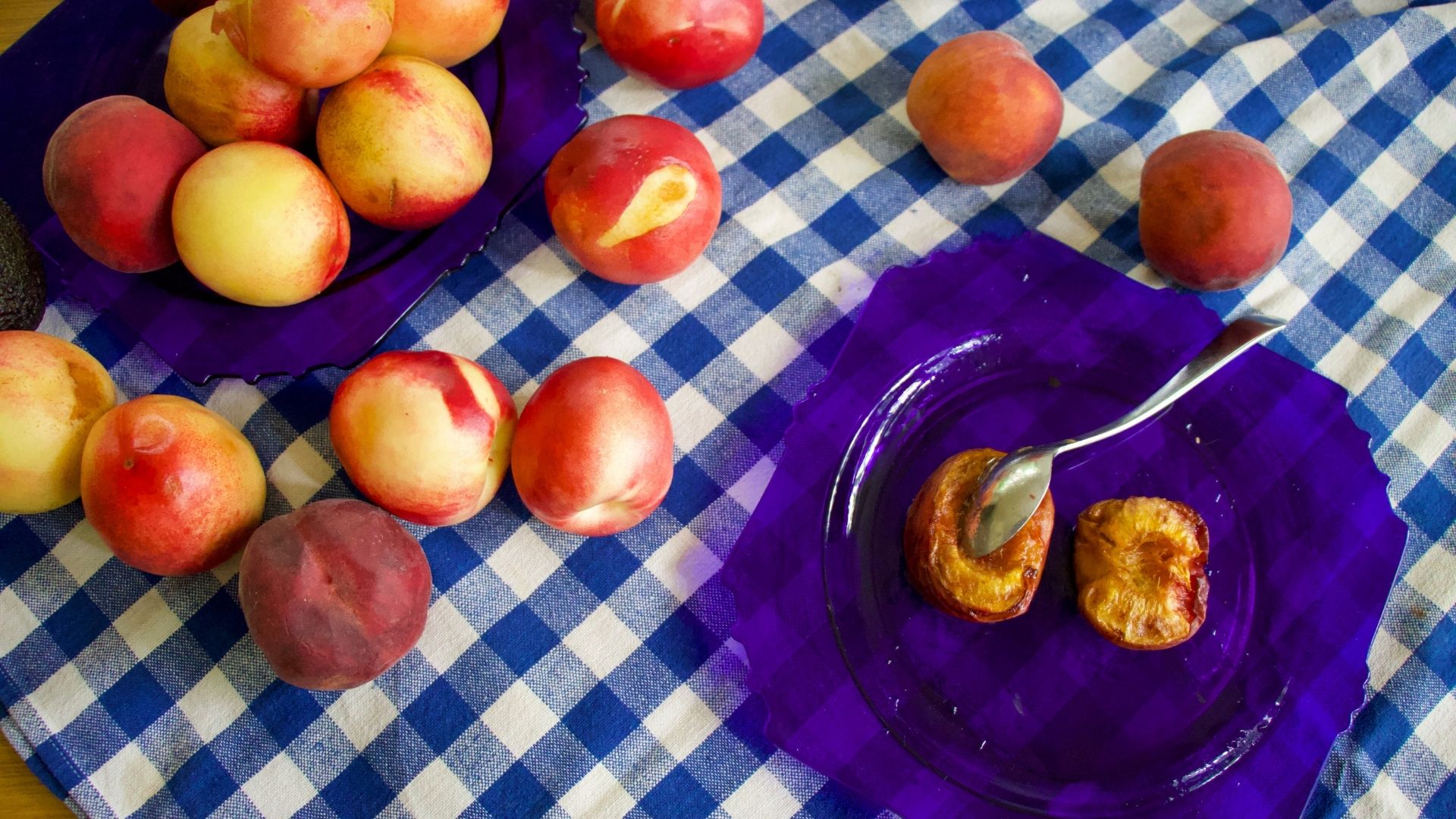 Nectarines, Peaches, Baked dessert on blue plate.