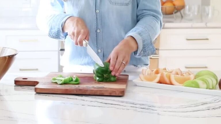 Woman Cutting Green Vegetable on Non-toxic Cutting Board