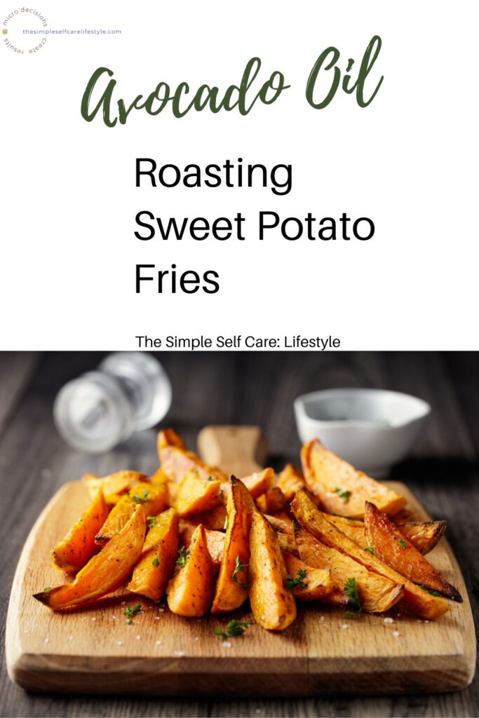 sweet potto fries on bamboo cutting board. Words Avocado Oil for roasting sweet potato fries. The Simple Self Care Lifestyle