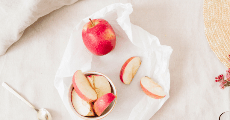 A whole apple and sliced
